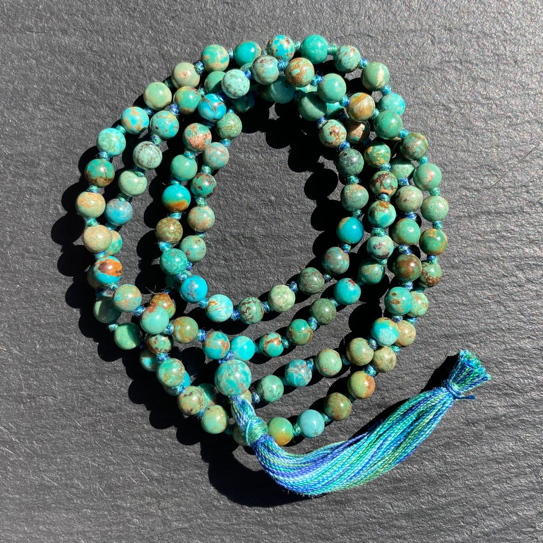 Turquoise 108 bead knotted